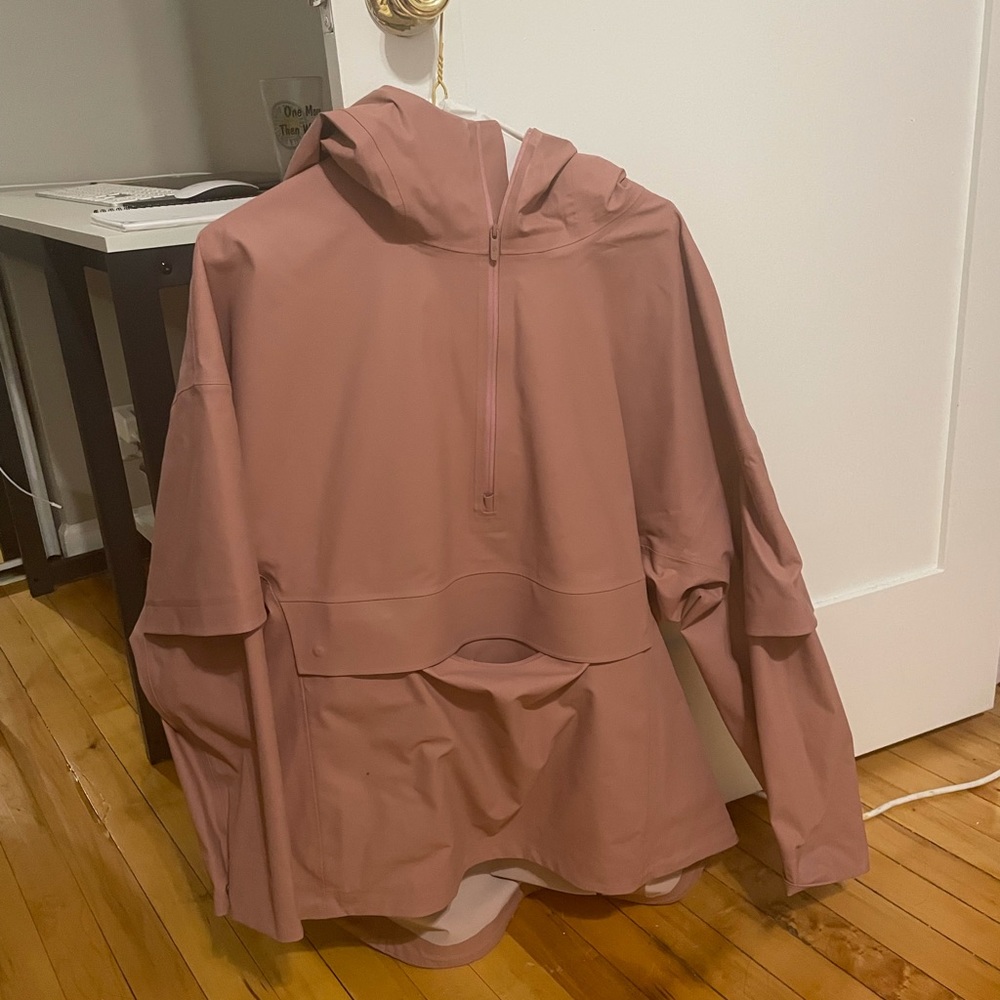 Lulu Lemon Medium blush pullover rain jacket. Great condition only worn twice.
